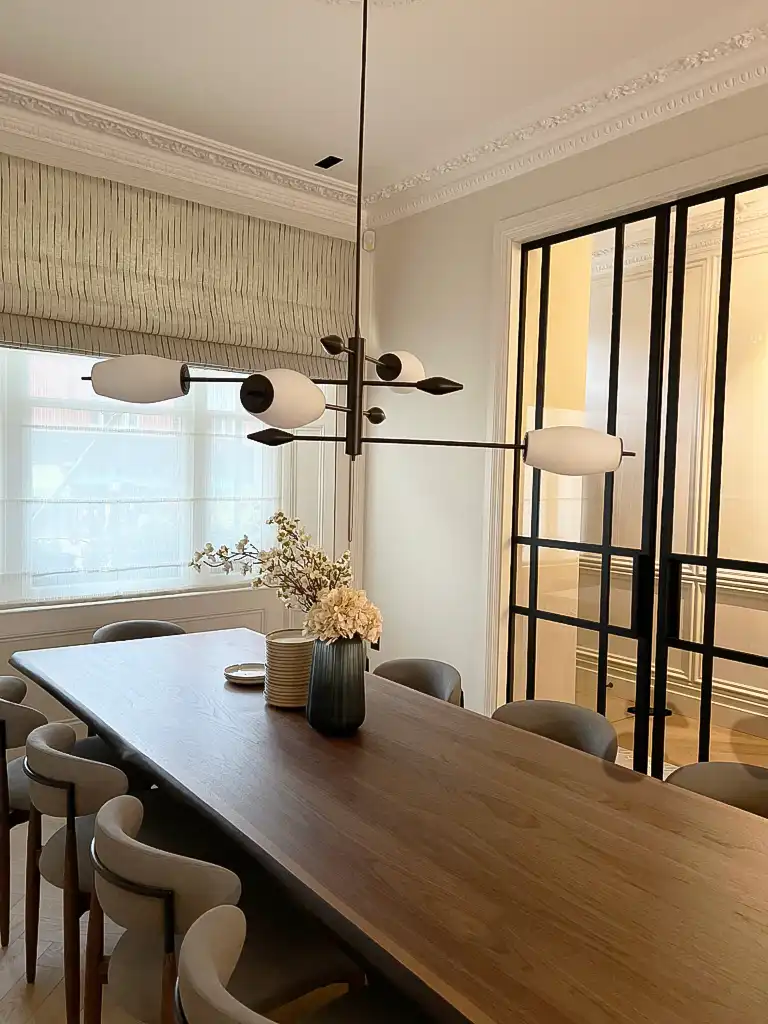 Dining area with pendant lighting and timber finishes Westbourne Grove London