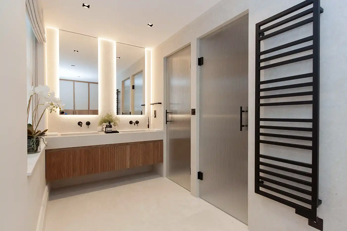 Minimal bathroom design with bespoke detailing London residential project